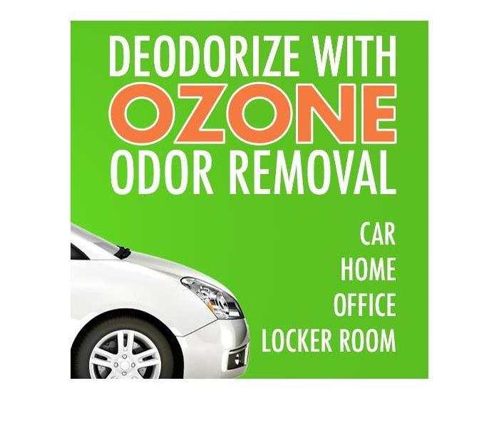 Front end of a car with the words "Deodorize with ozone odor removal, car, home, office, locker room" 