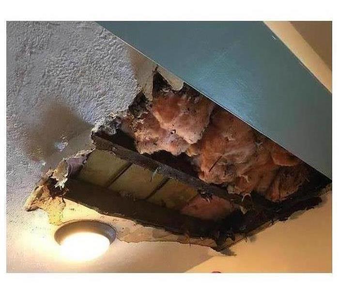 Collapsed ceiling from heavy rain